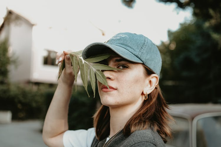 Girl Holding A Leaf 