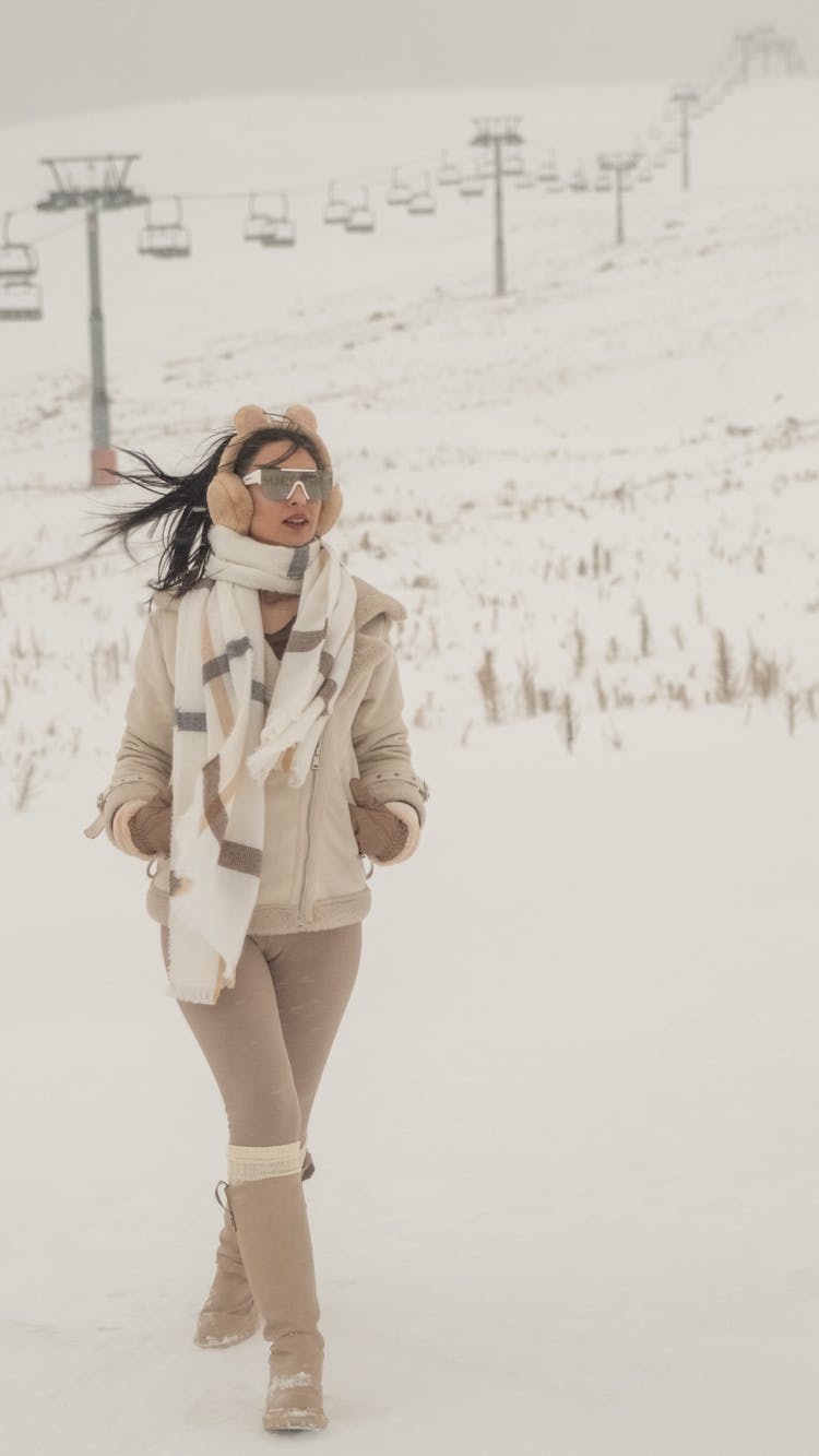 Woman Wearing A Fashionable Winter Outfit Standing Outside