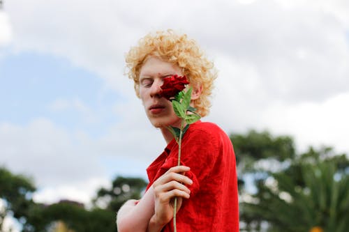 Man Holding Red Rose