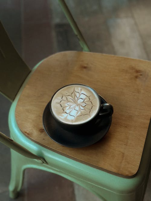 Floral Pattern Latte Art on a Cup of Cappuccino