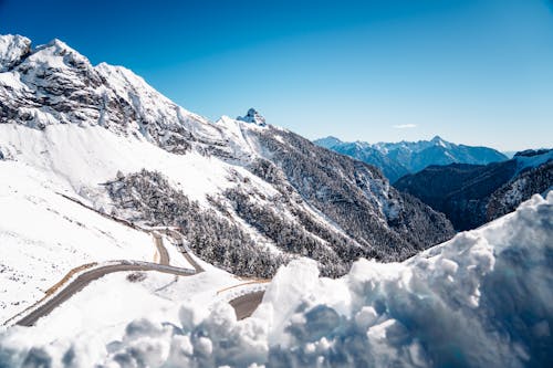 Winding Road on Snowed Valley