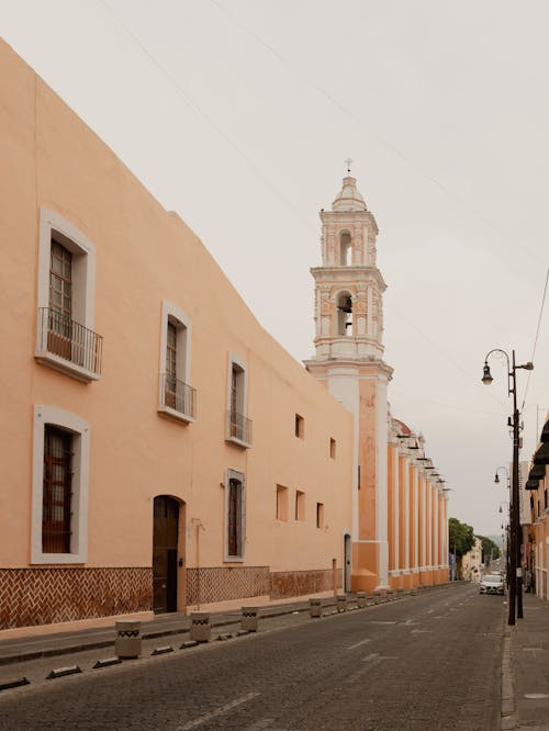 Tower of Conventual Church of St Jerome over Street in Puebla