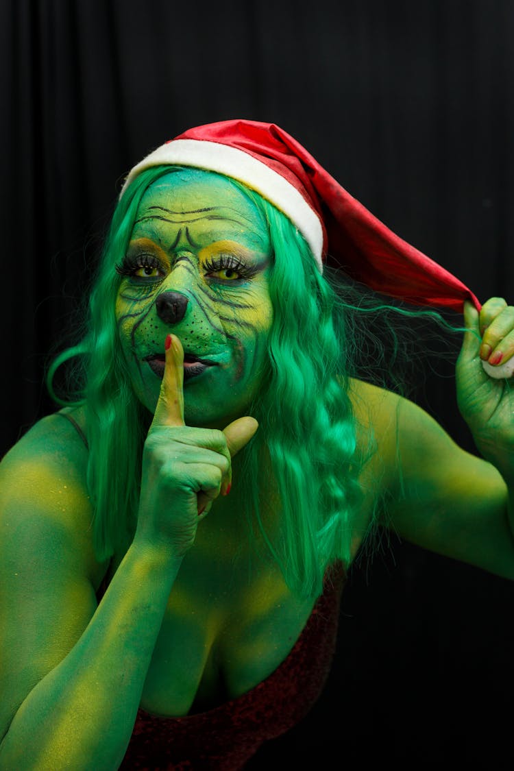 Portrait Of Woman In Grinch Costume