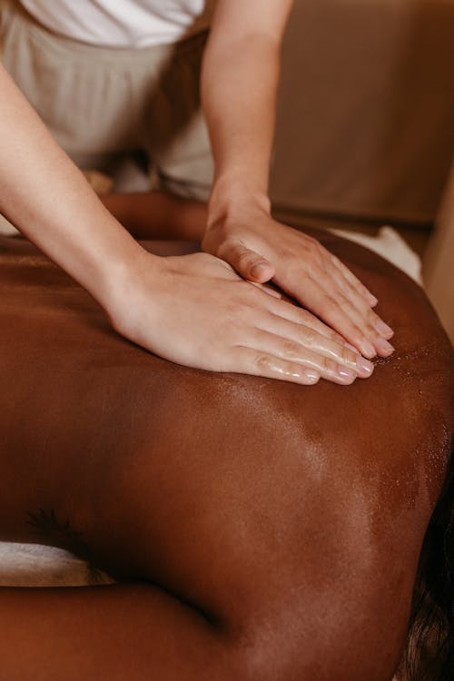 Massage Therapist Giving a Massage 