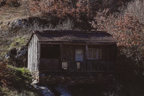 Old Wooden Cottage on a Hill 
