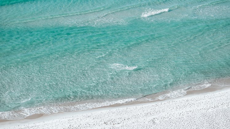 Blue Waves On Sea Shore