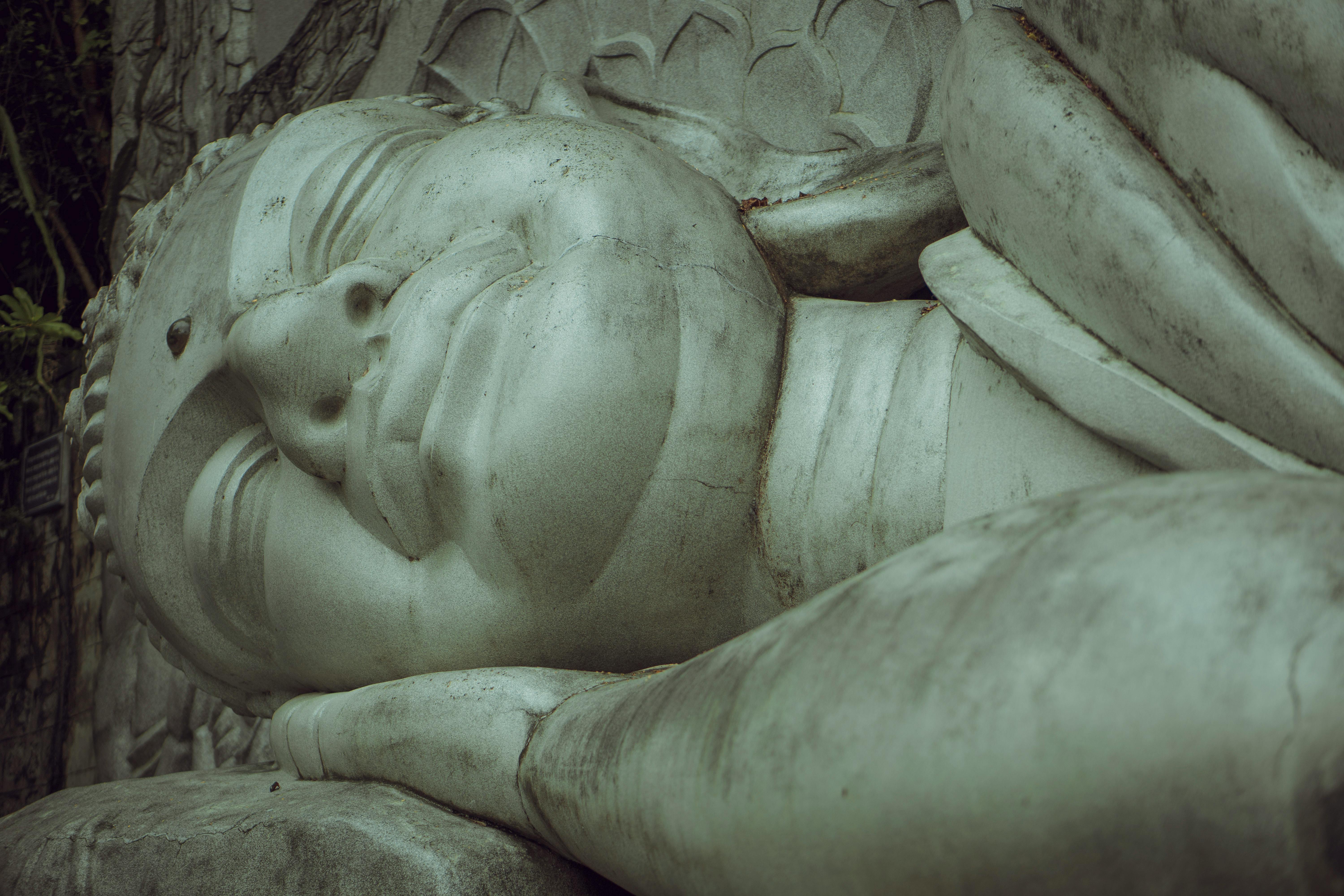 Detailed view of the Sleeping Buddha sculpture at Long Son Pagoda in Nha Trang, Vietnam.
