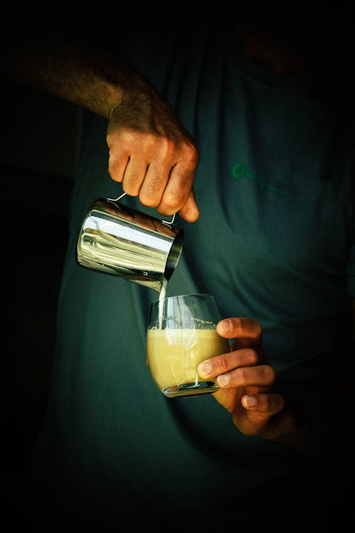 Close-up of a Man Making Cappuccino 