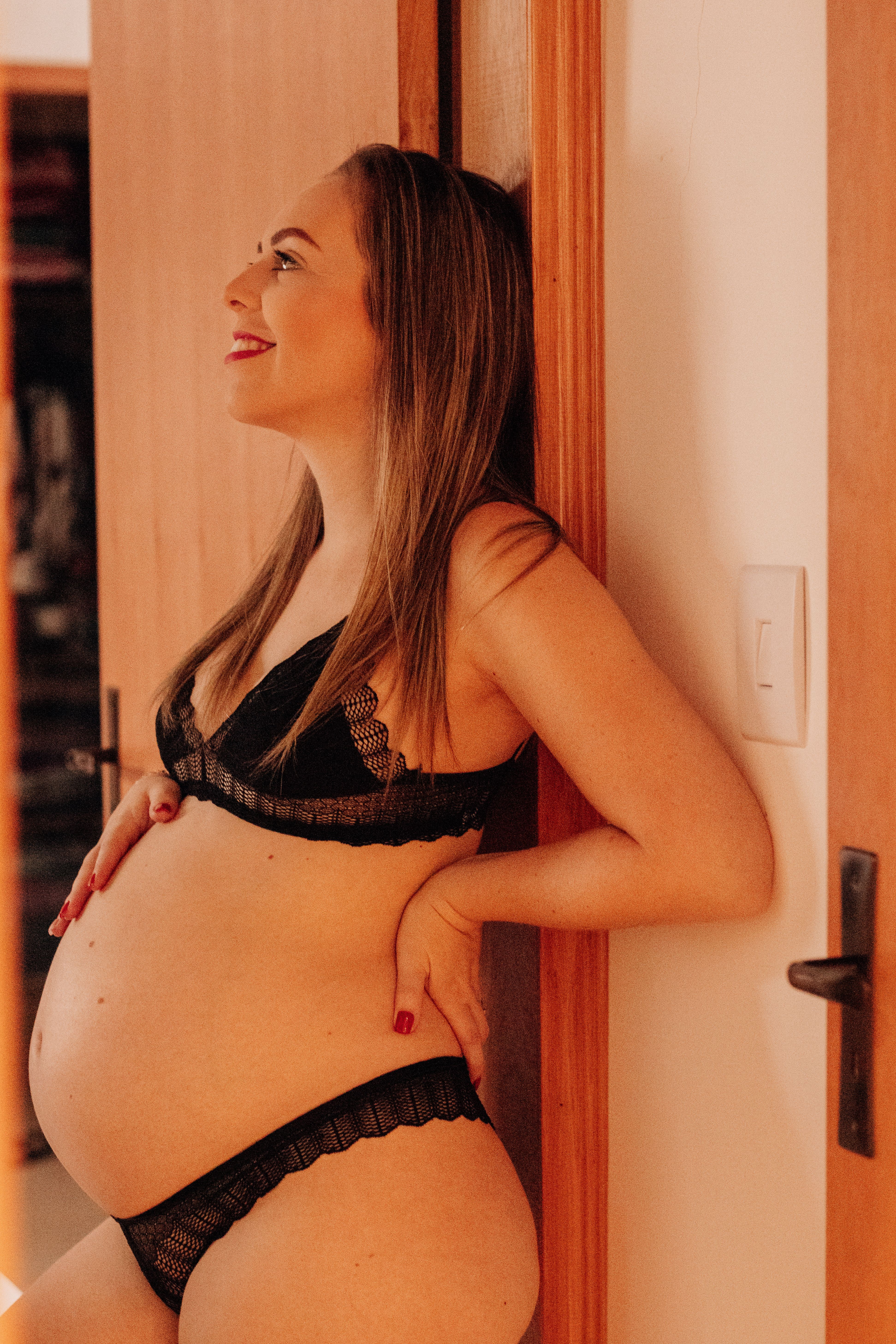 pregnant lingerie sexy Attractive Pregnant Woman in Bed in Underwear. Stock Photo main image 0