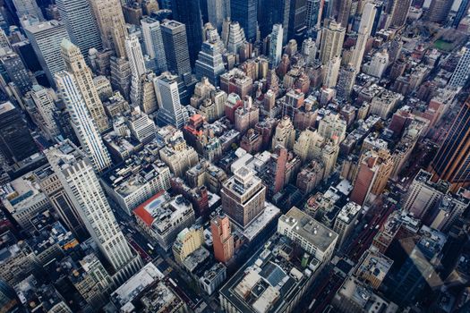 A breathtaking aerial view of crowded skyscrapers in Manhattan, New York City showcasing urban density.