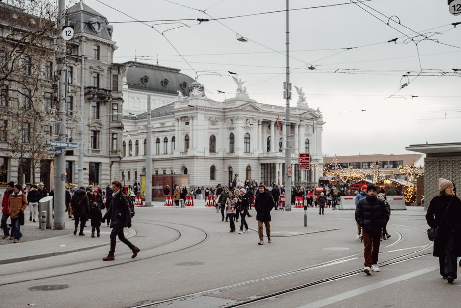 A tram moving through the bustling streets of Zurich, Switzerland