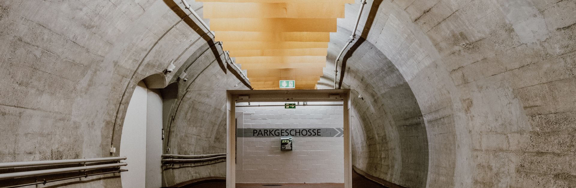 Concrete underground passage with modern lighting in Zurich, Switzerland.