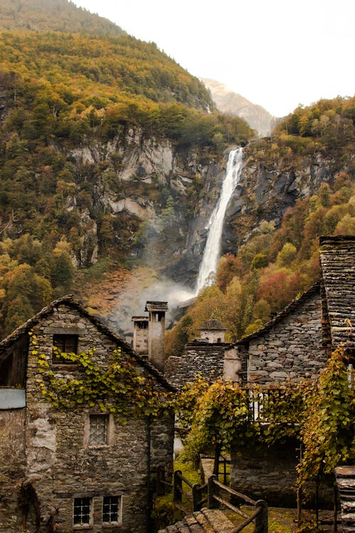 Buildings by the Waterfall