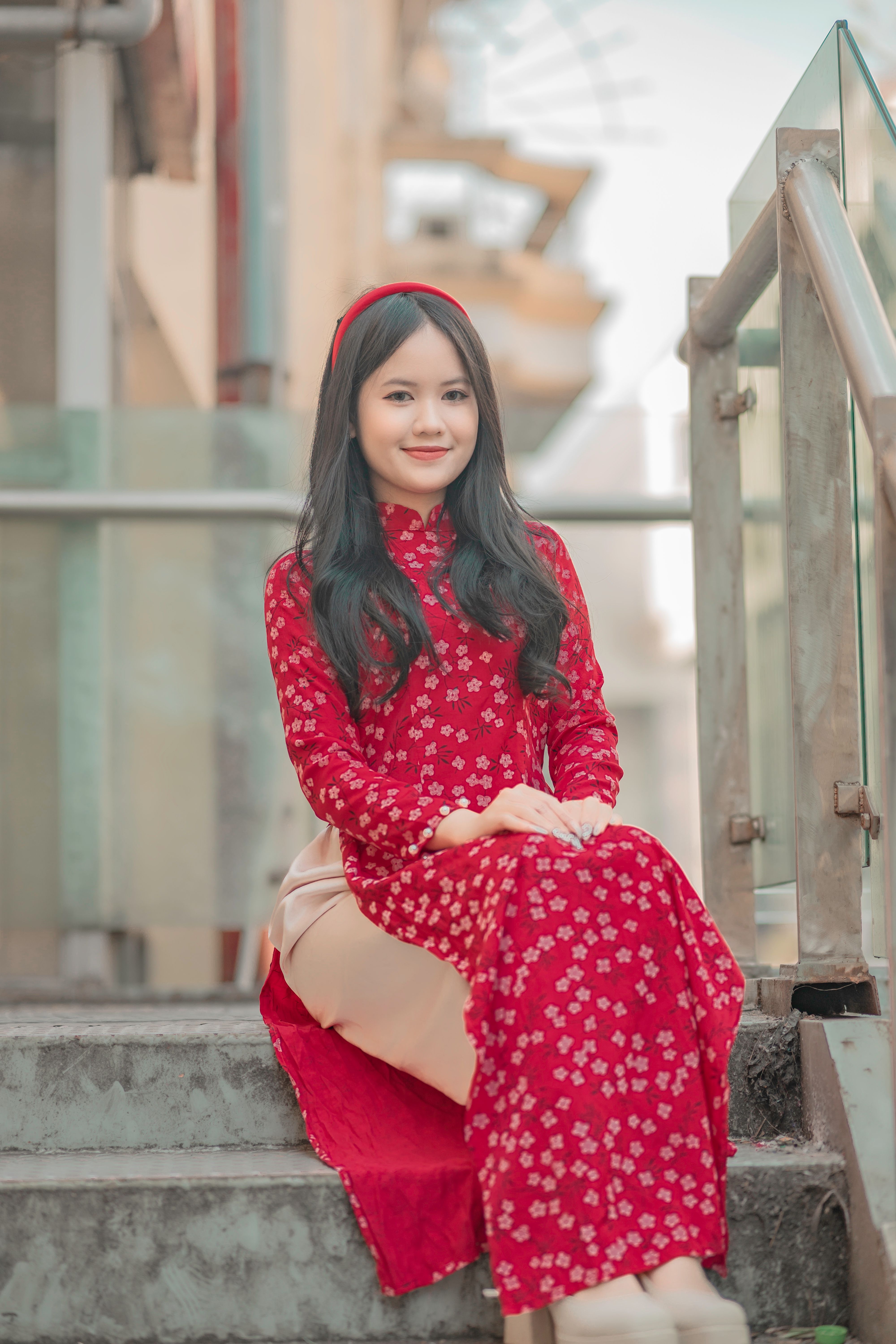 Girl in a Red Dress Sitting on the Stairs · Free Stock Photo