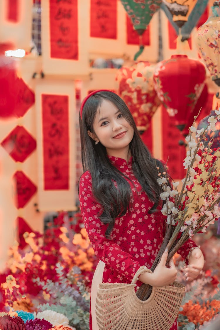 Smiling Girl Holding Flowers 