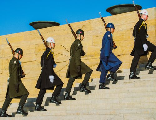 Free Soldiers in ceremonial uniforms march at Anıtkabir, Ankara, Türkiye. Stock Photo