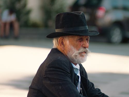 Man with a Gray Beard Wearing a Hat
