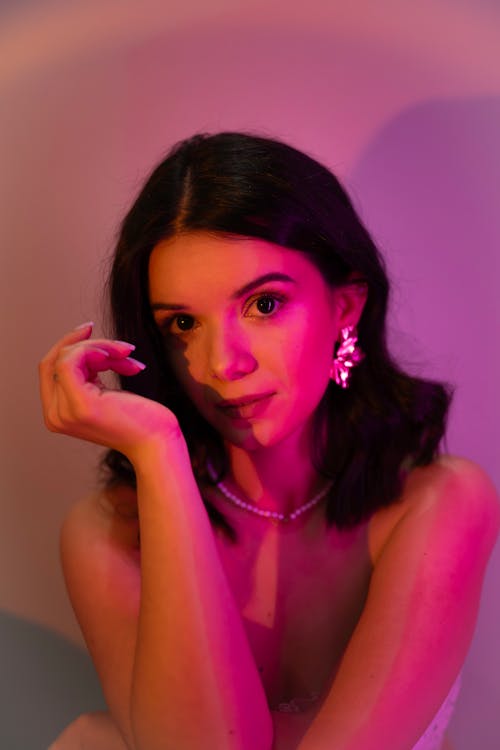 Portrait of a Brunette in a Pink Light