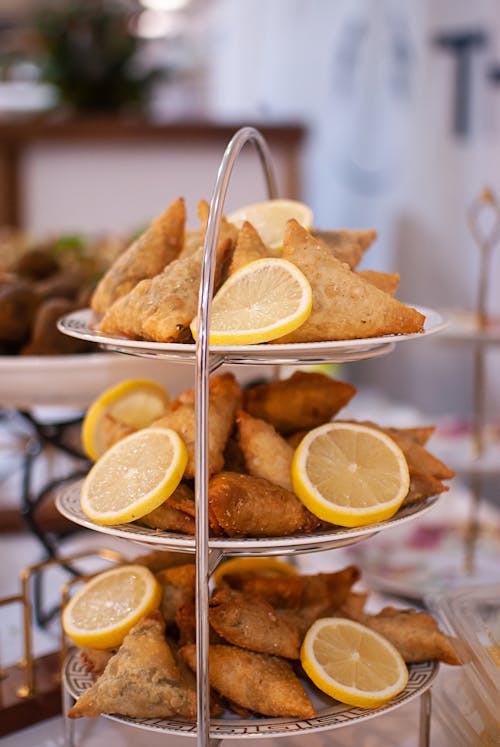 Fried Fish Displayed with Slices of Lemon