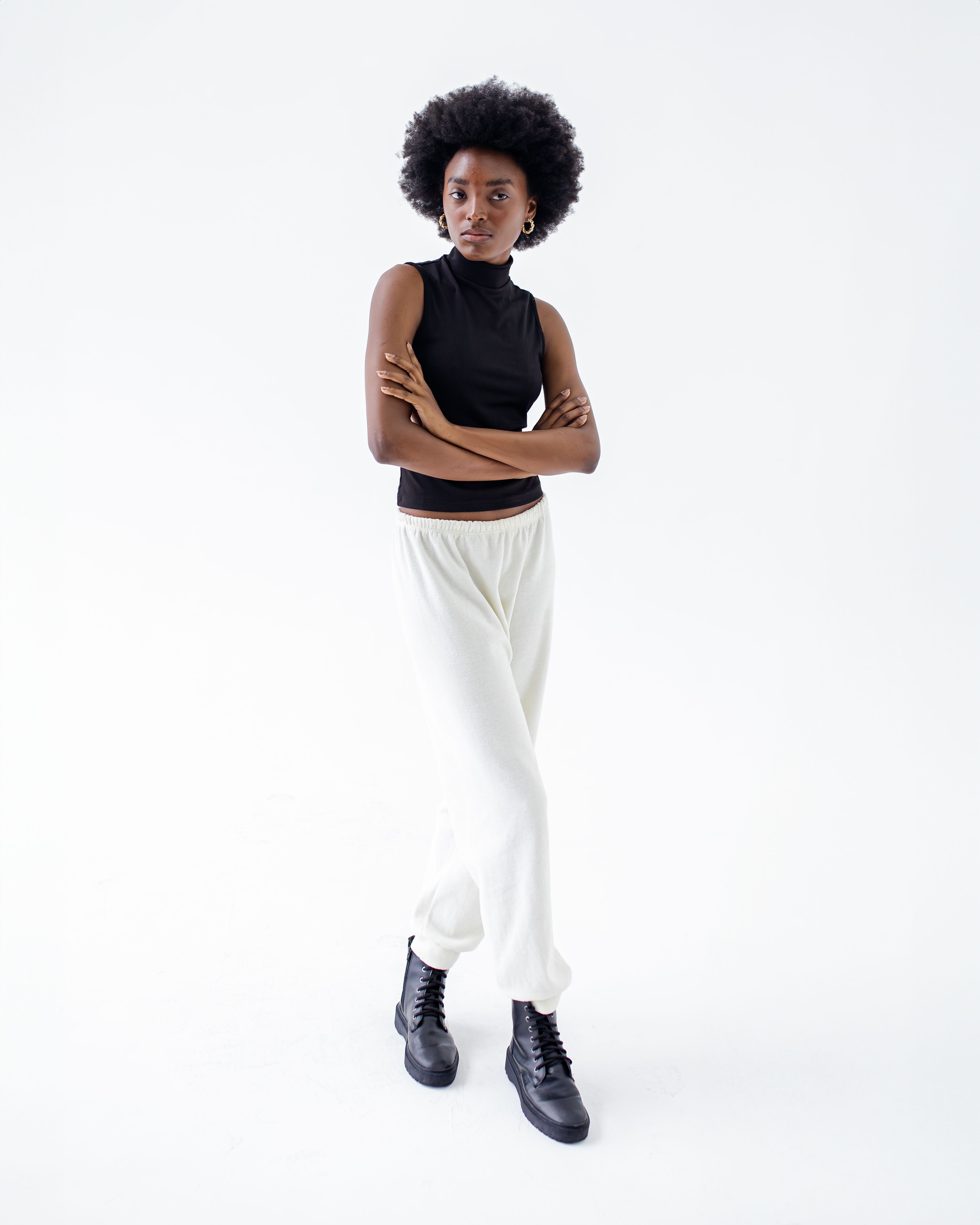 Sleeveless Turtleneck and Wide-Leg Trousers