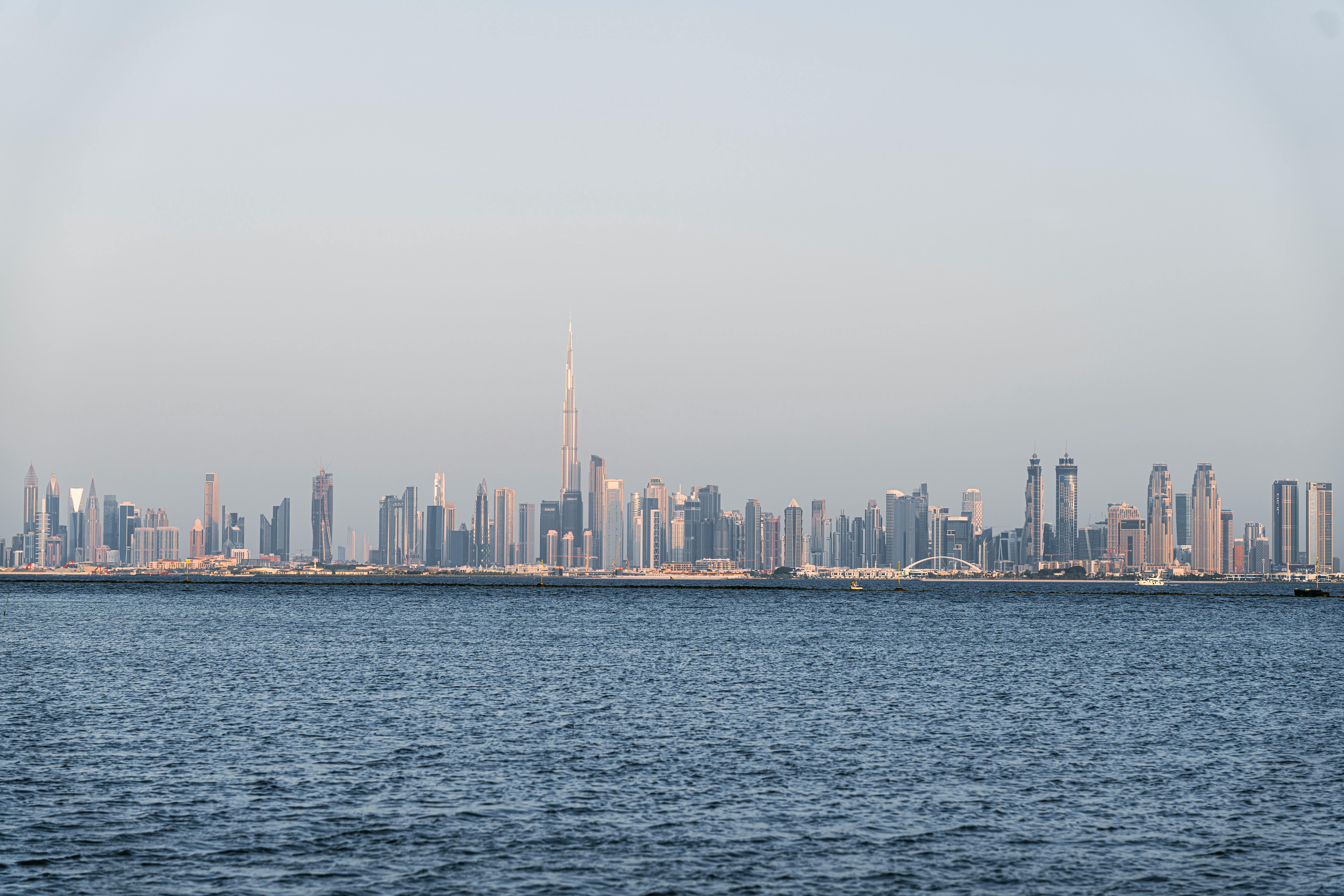 A stunning view of Dubai's skyline featuring Burj Khalifa across the sea.