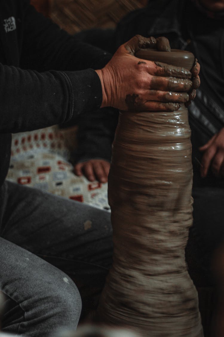 Two People Doing Pottery