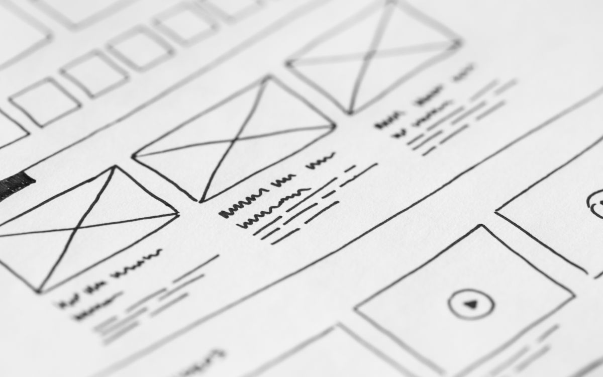A hand-drawn website wireframe sketch