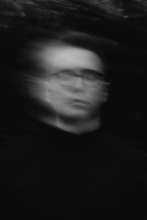 Portrait of Man in Blur in Black and White 