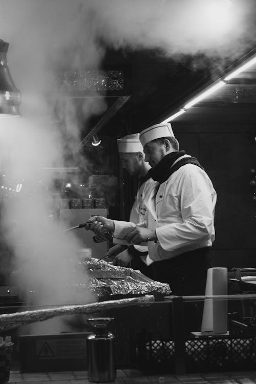 Free Chef in a Kitchen in Black and White  Stock Photo