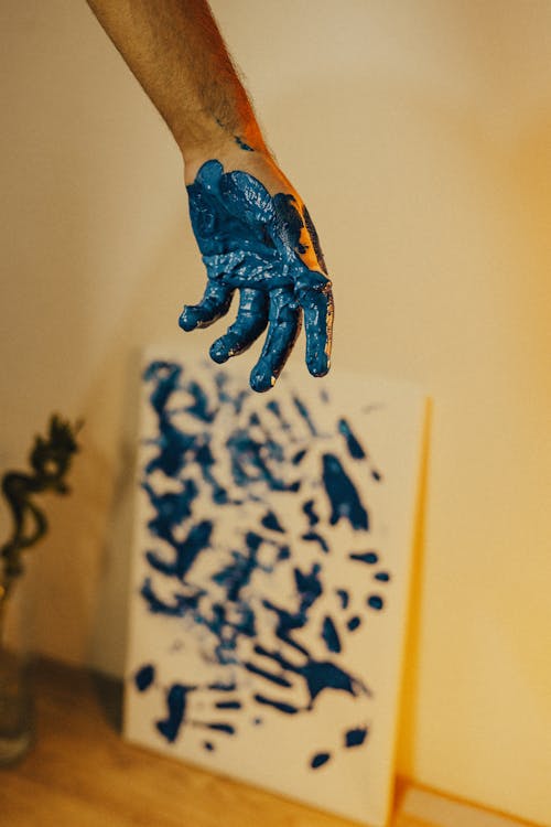 Blue Paint on Hand