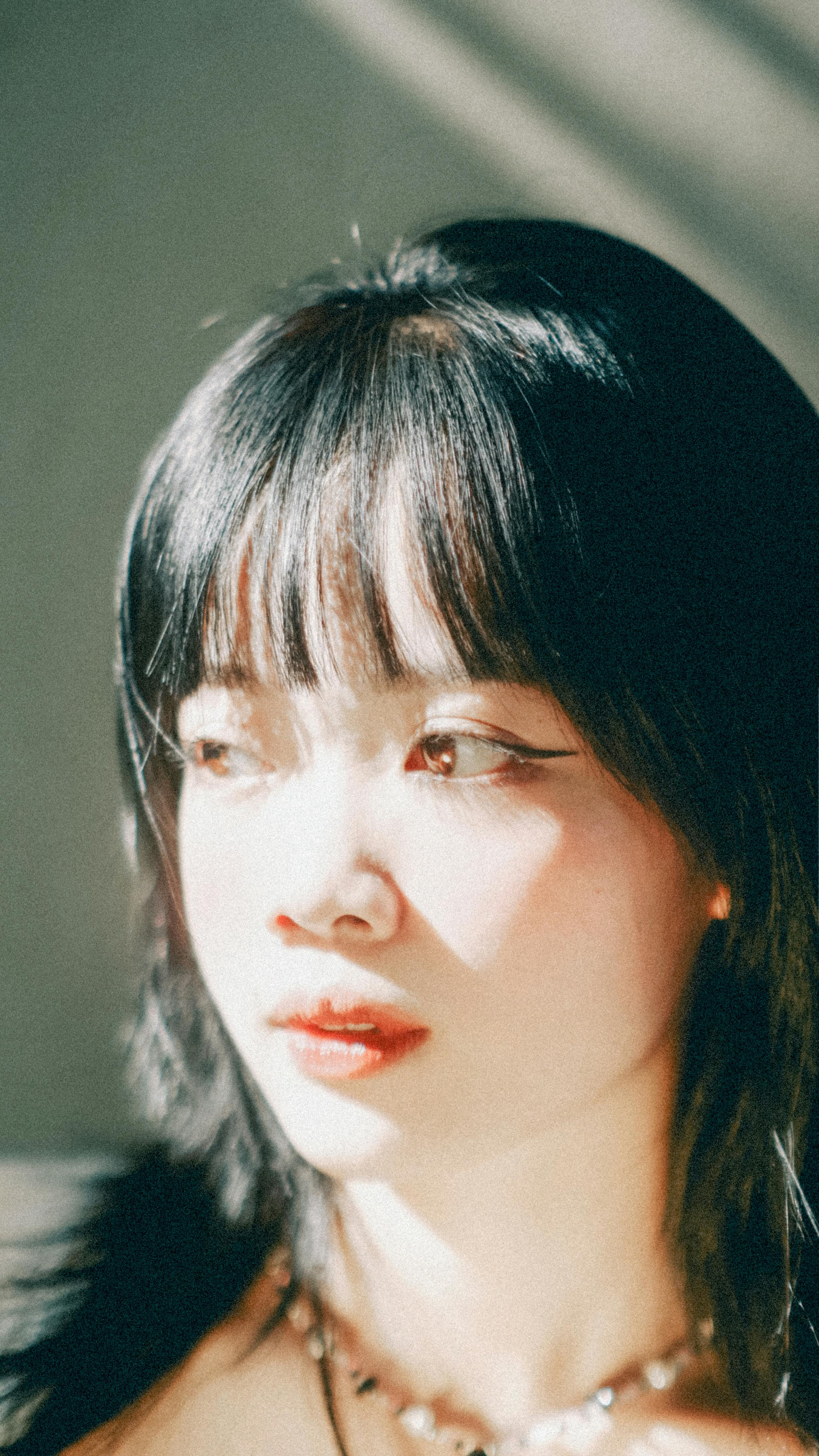young woman in bright sunlight