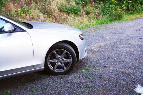 Front Car Parked on Dirt Road