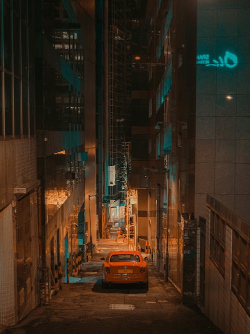 Orange Bentley Mulsanne Parked in a Narrow Steep Alley