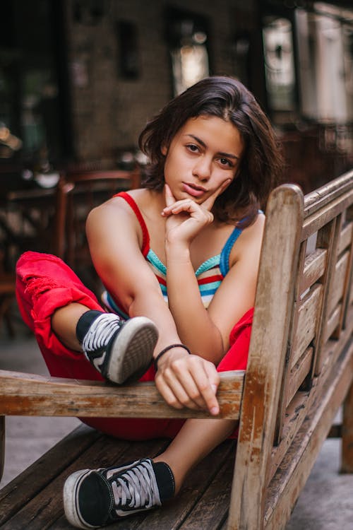 Woman Sitting On Bench