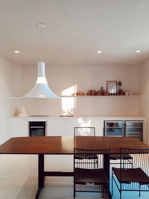 Sleek interior with contemporary furniture and a warm atmosphere.