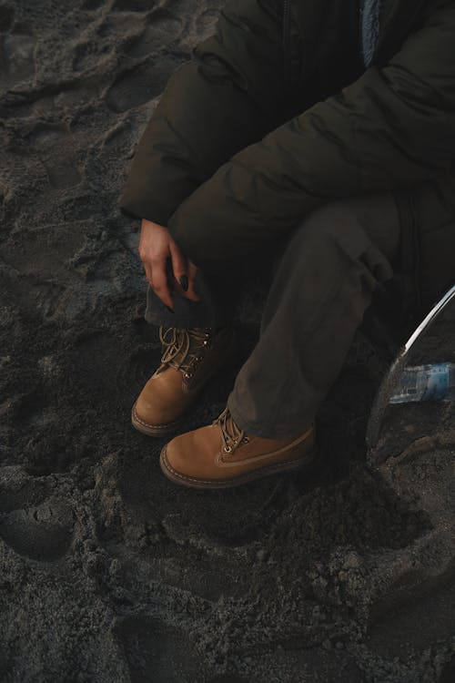 Woman in Boots at Sandy Beach