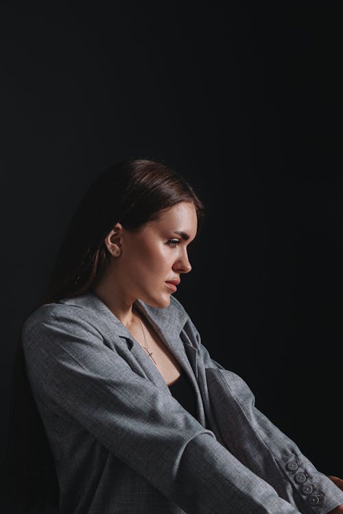 Portrait of Brunette Woman Wearing Bra and Blazer · Free Stock Photo