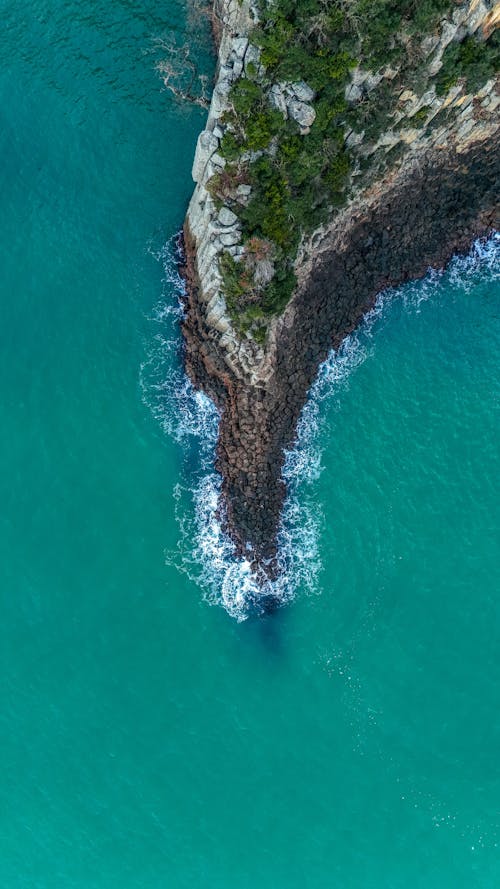 Безкоштовне стокове фото на тему «берег моря, вертикальні постріл, знімок із дрона»