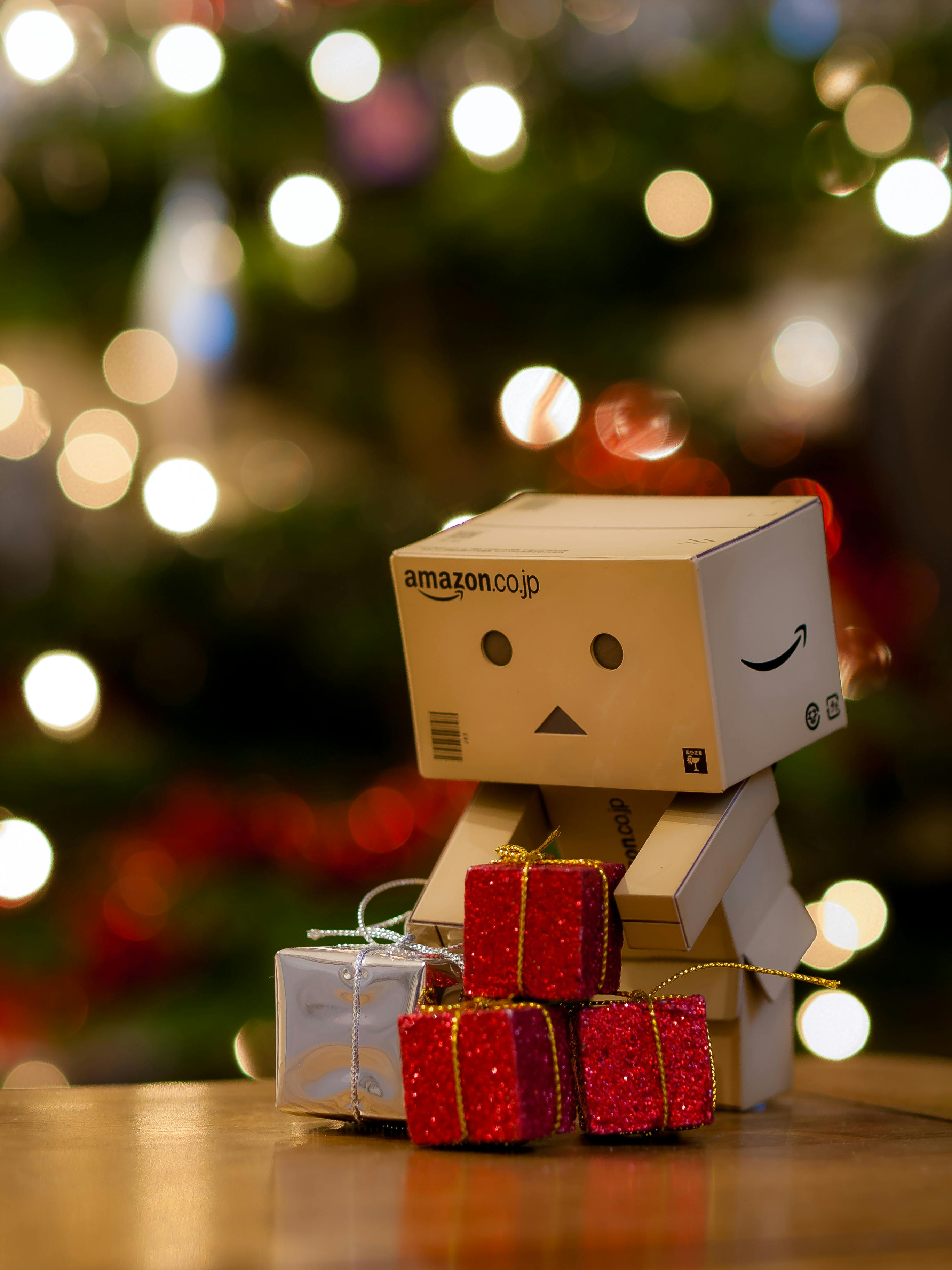 amazon cardboard doll with christmas boxes