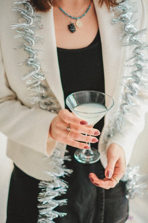 Holding New Years Eve Cocktail