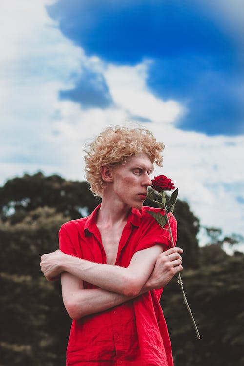 Man Holding Red Rose