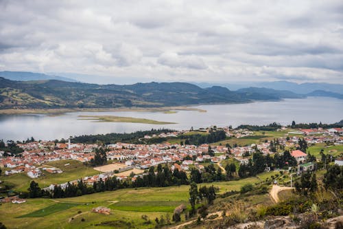 Aerial View of a Town near a Lagoon 