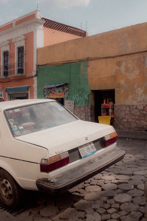 Back of a White Volkswagen Jetta Parked on the Side of a Street