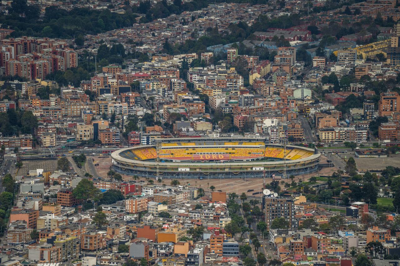 aerial view of bogot s urban landscape featuring estadio el camp n