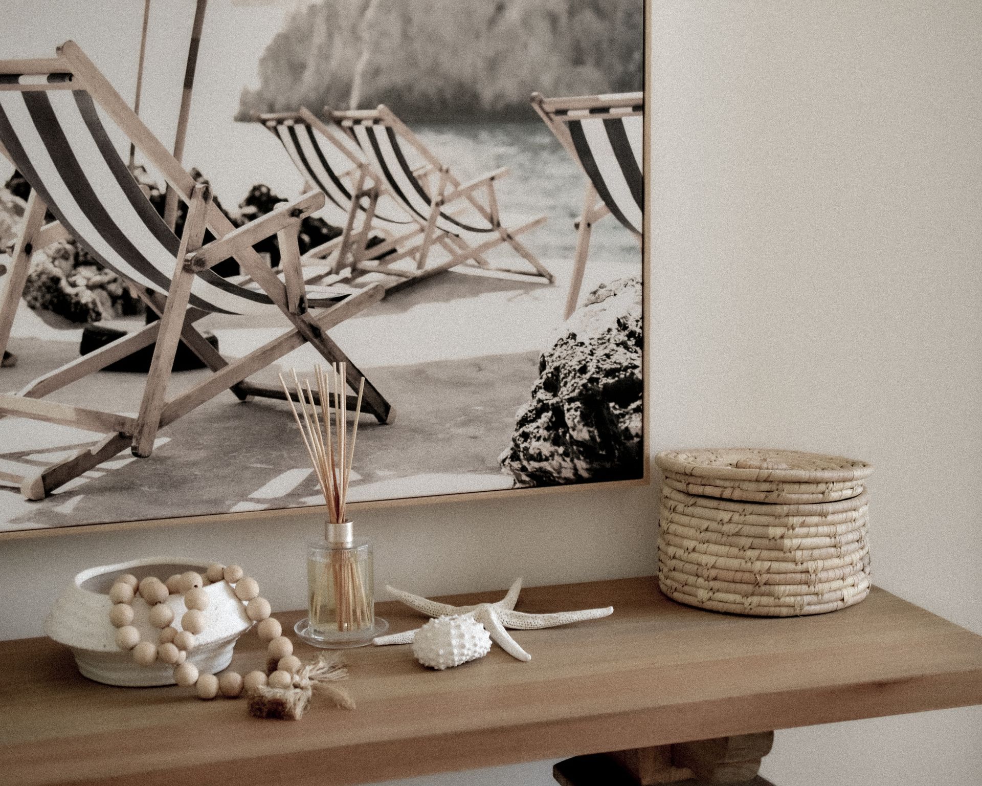 Stylish minimalist interior with beach-themed decor and bamboo elements.