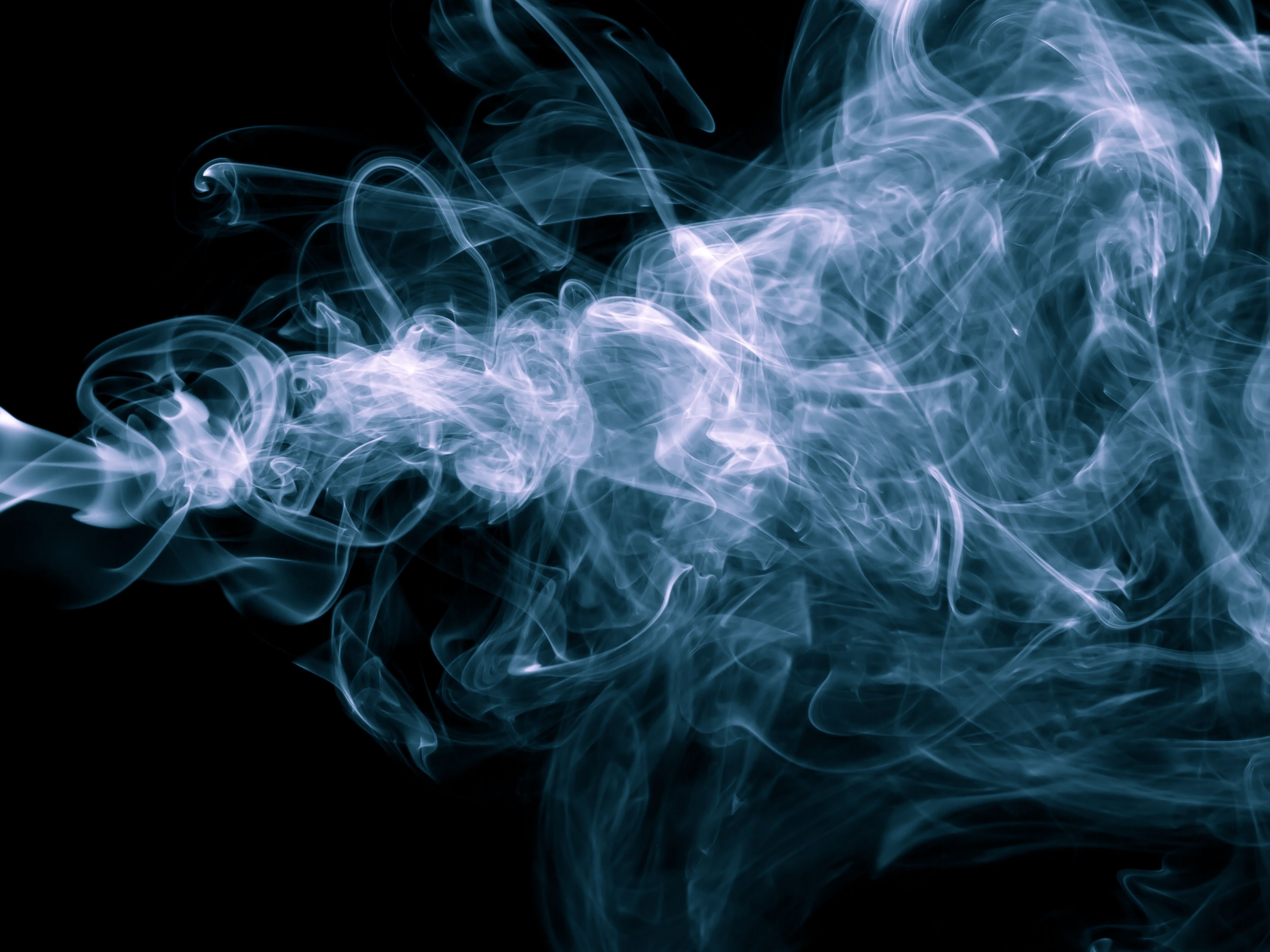 White Smoke Floating on Black Background · Free Stock Photo