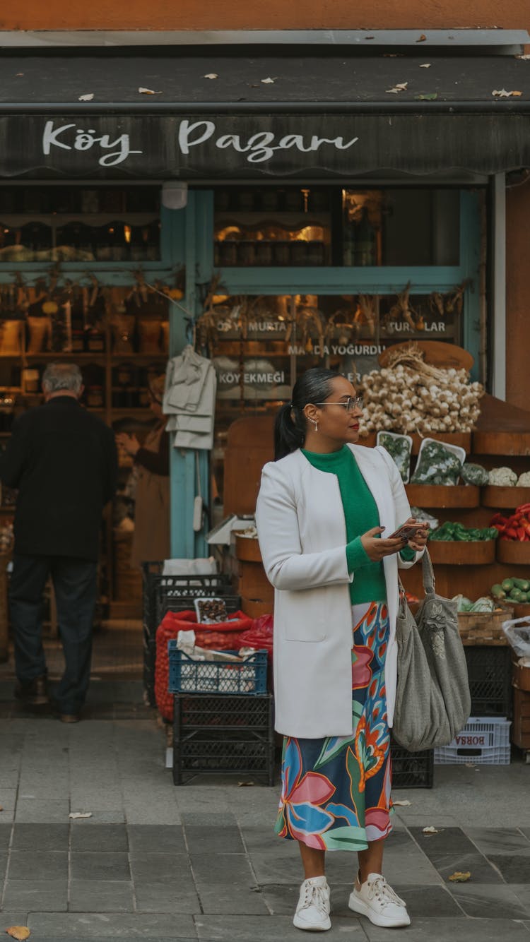 Woman In Front Of A Grocery Store 