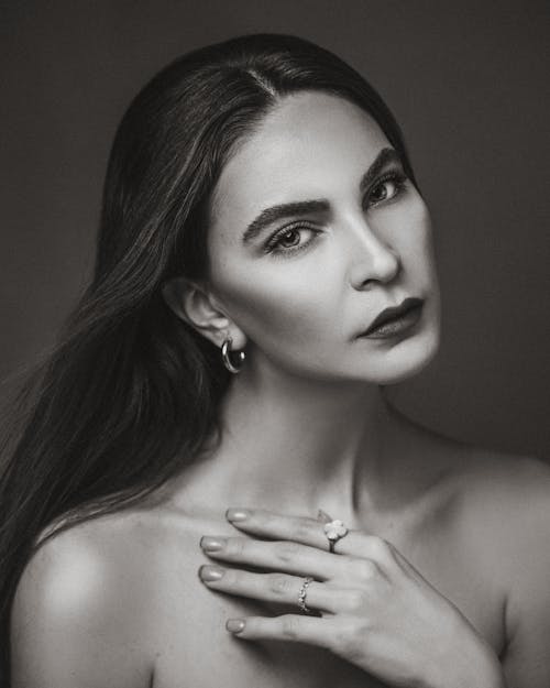 Black and White Studio Shot of a Young Woman Wearing Makeup 