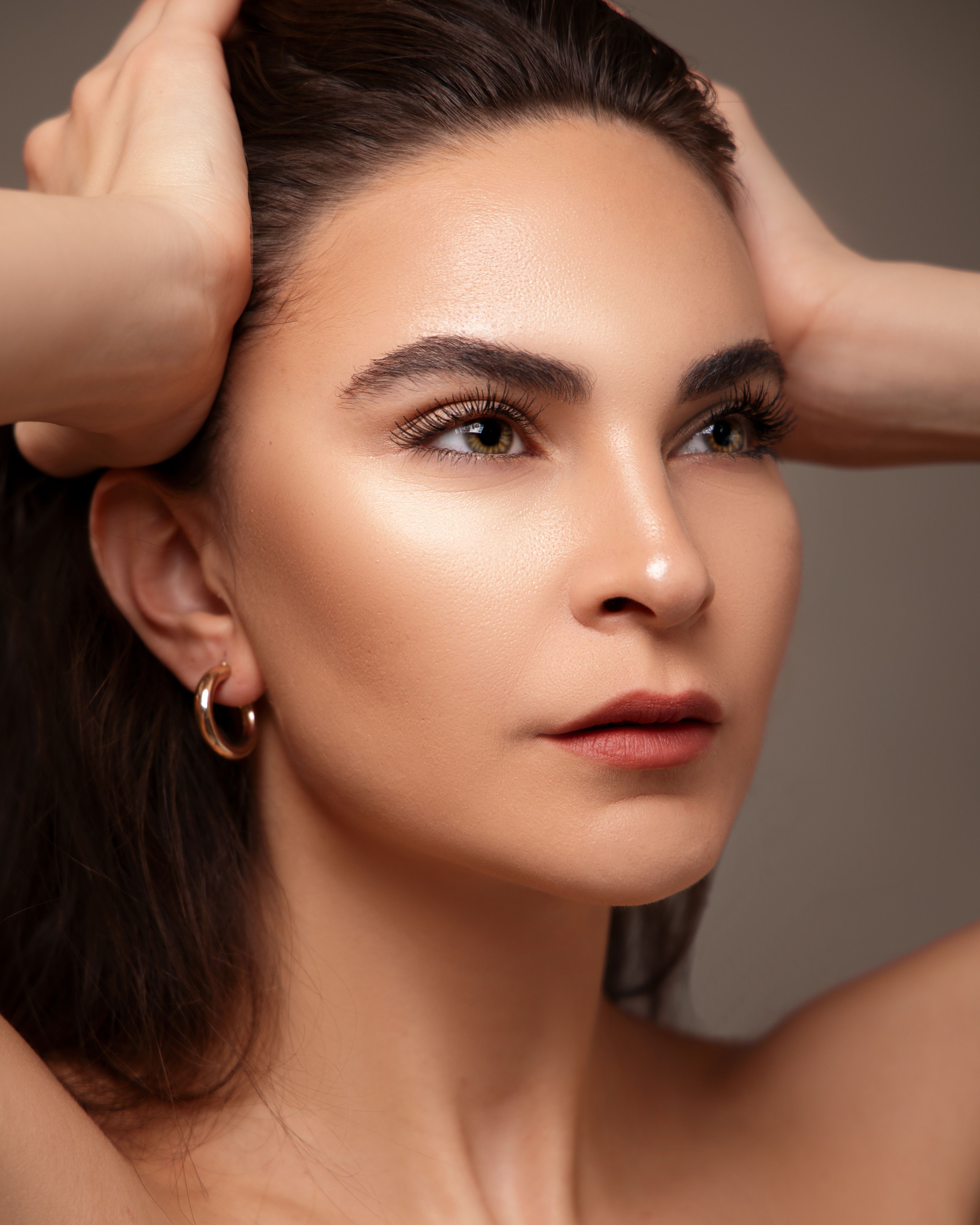 A woman with radiant, glowing skin