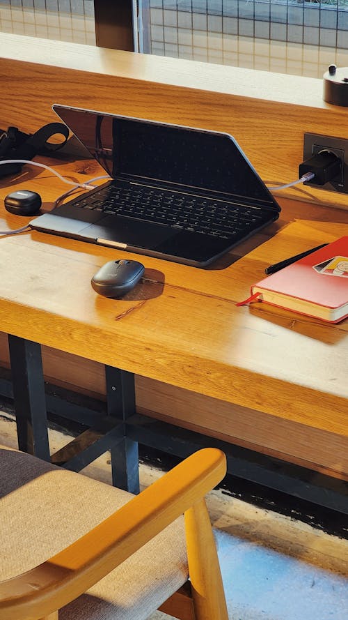 Laptop with Mouse on Desk